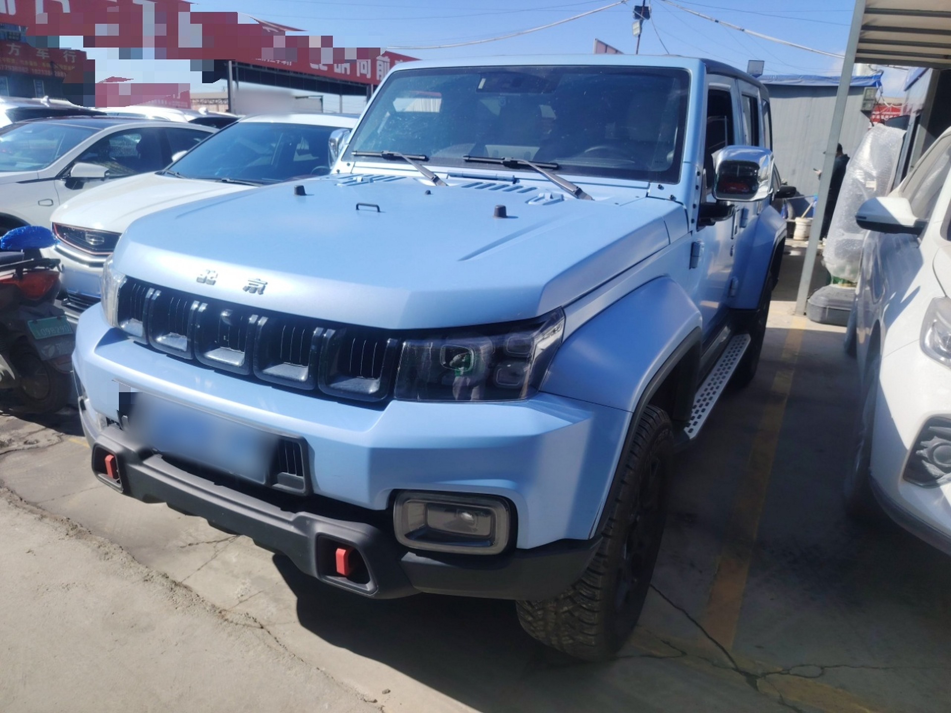 Под передней частью автомобиля