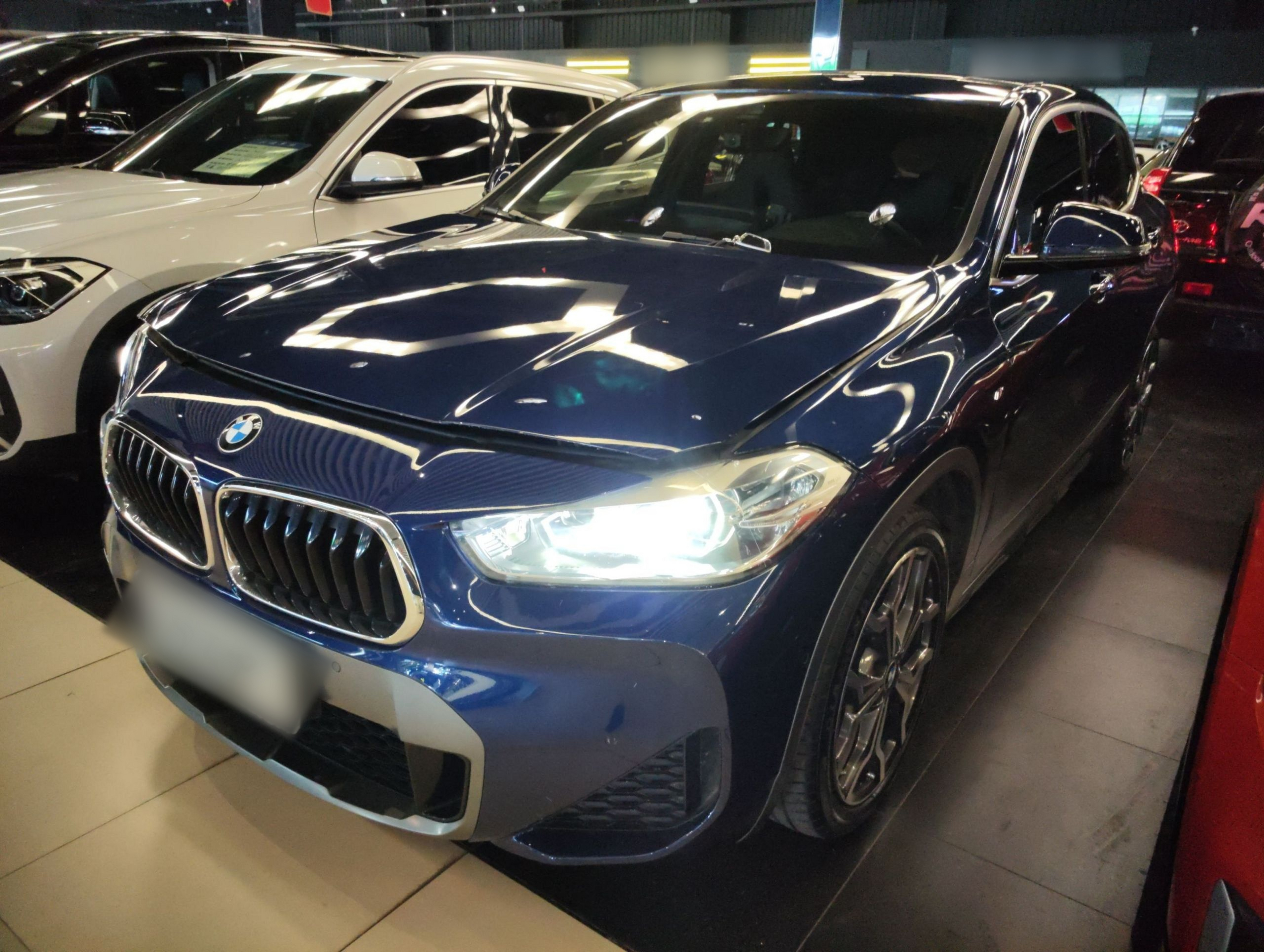 Под передней частью автомобиля