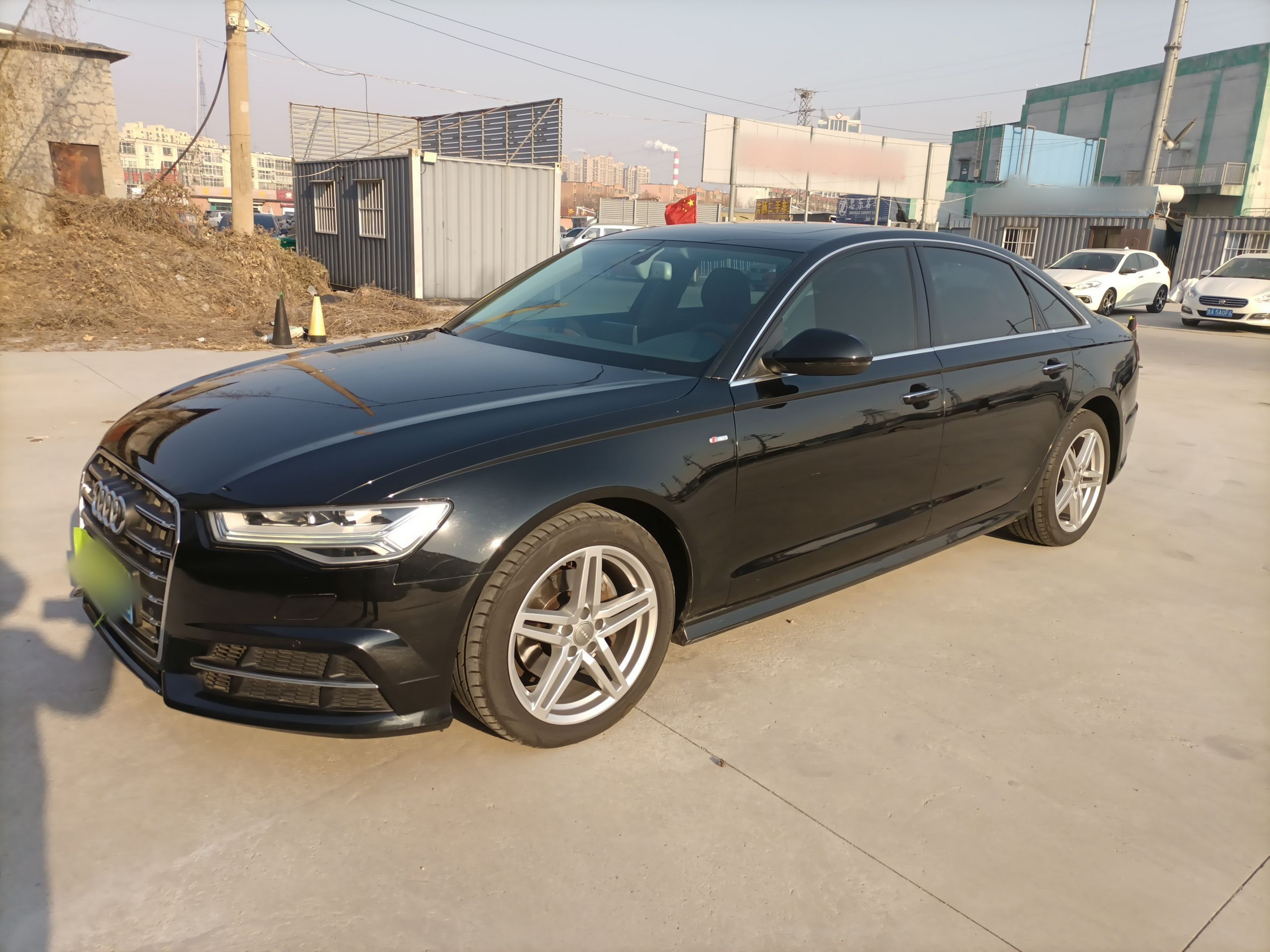 Под передней частью автомобиля