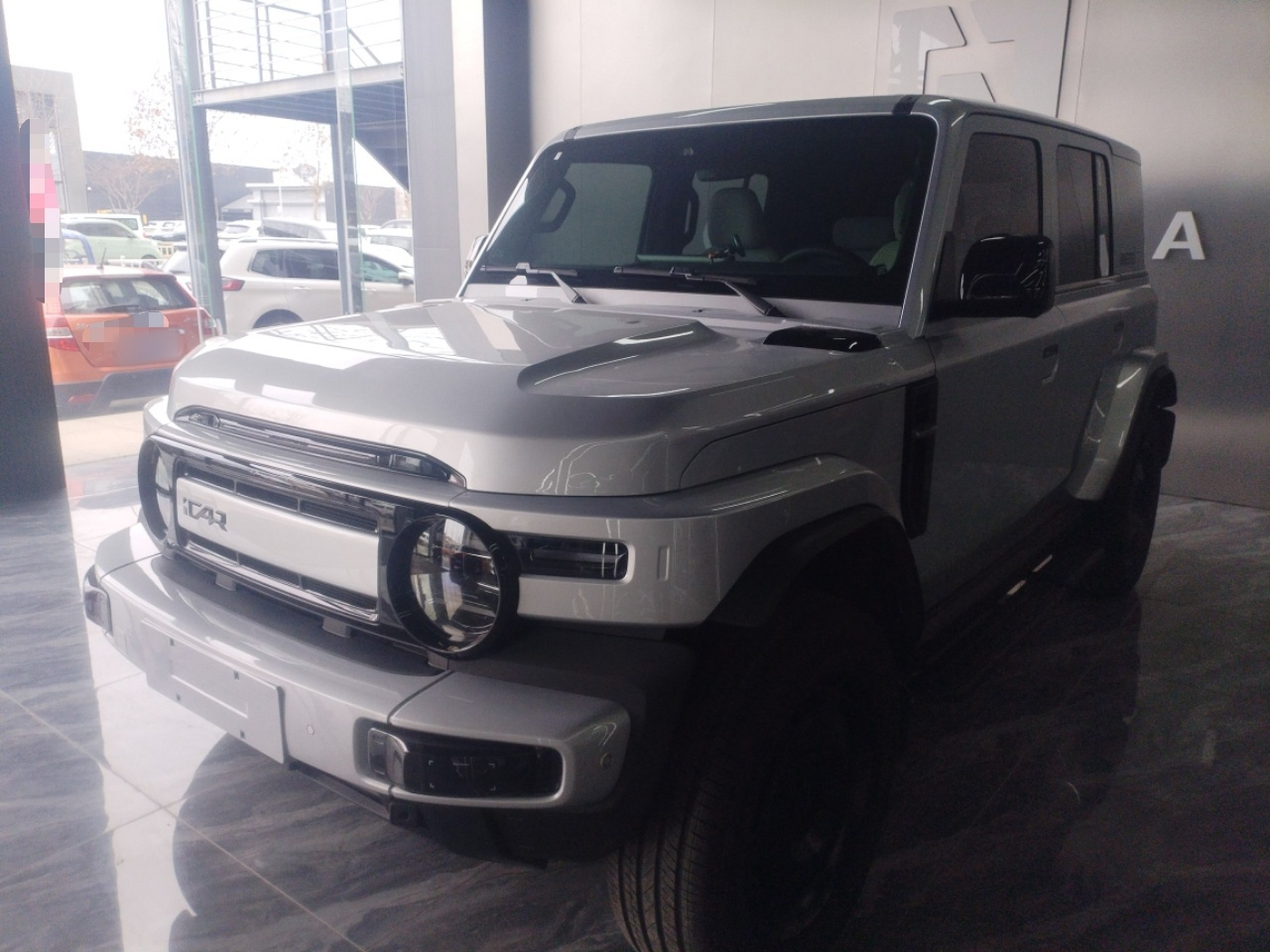 Под передней частью автомобиля