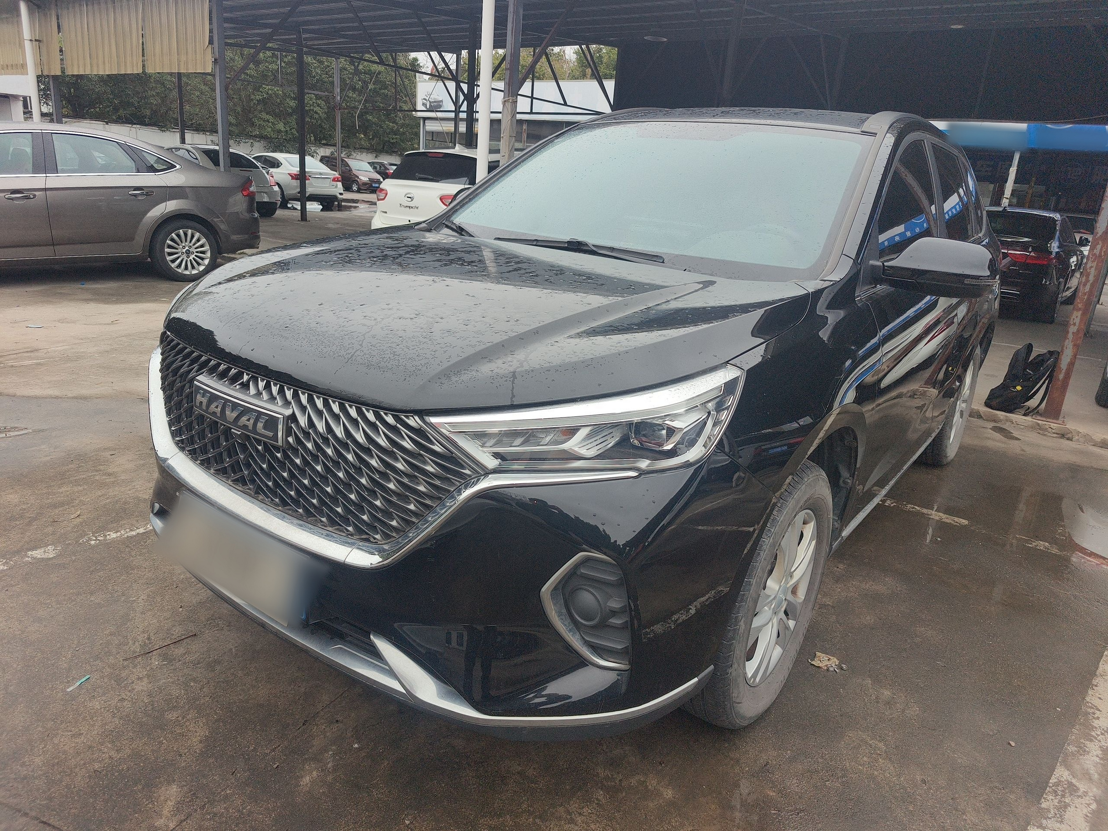 Под передней частью автомобиля