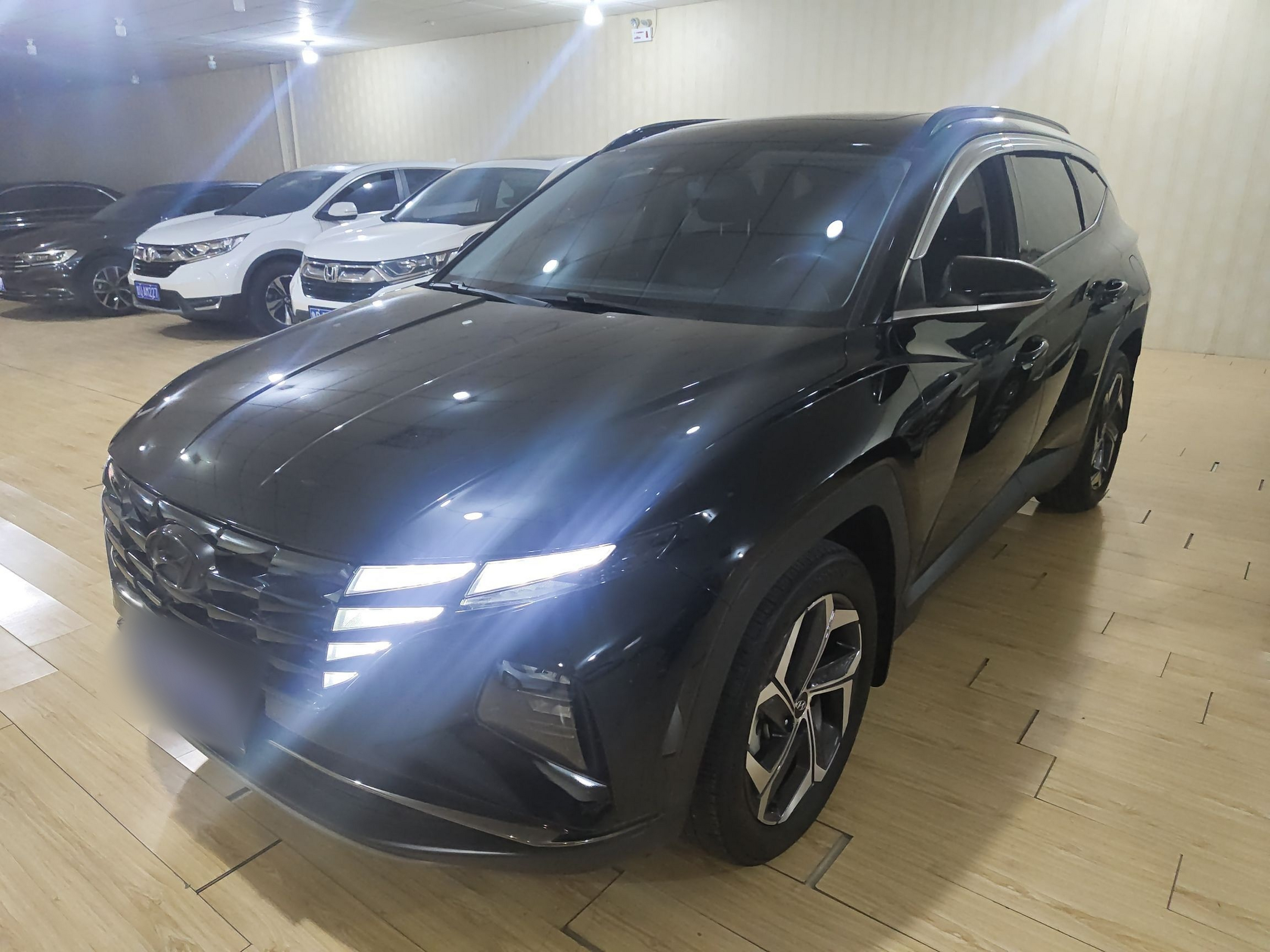 Под передней частью автомобиля