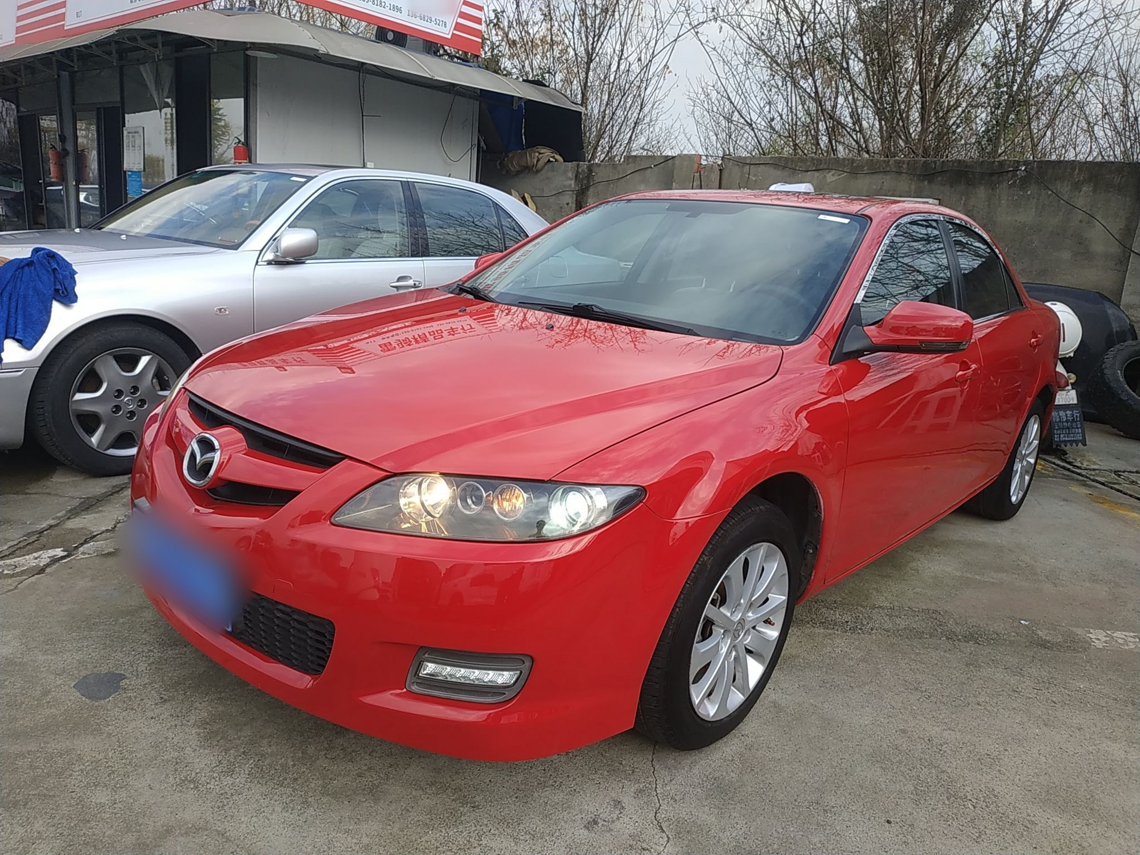 Под передней частью автомобиля