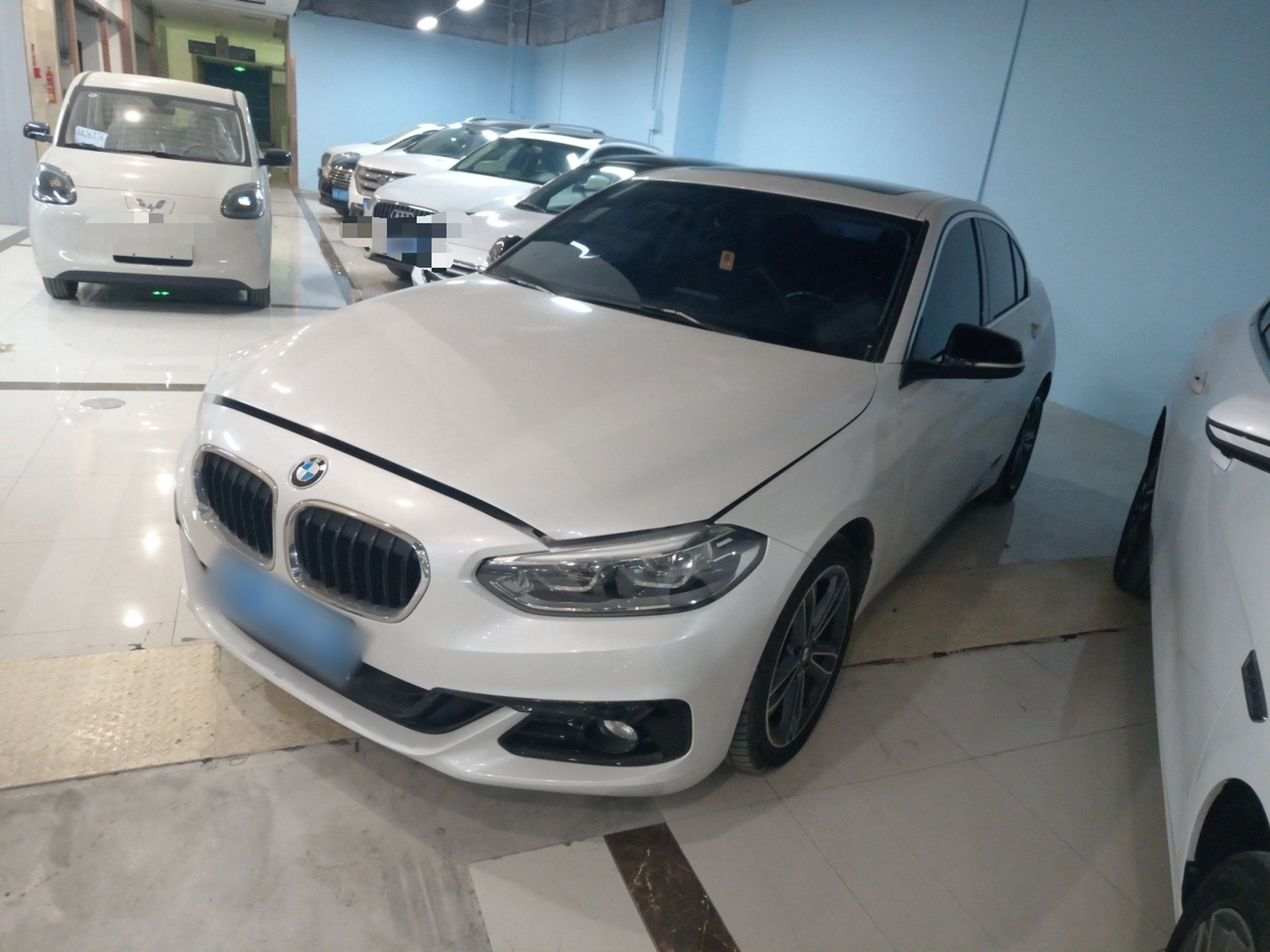 Под передней частью автомобиля