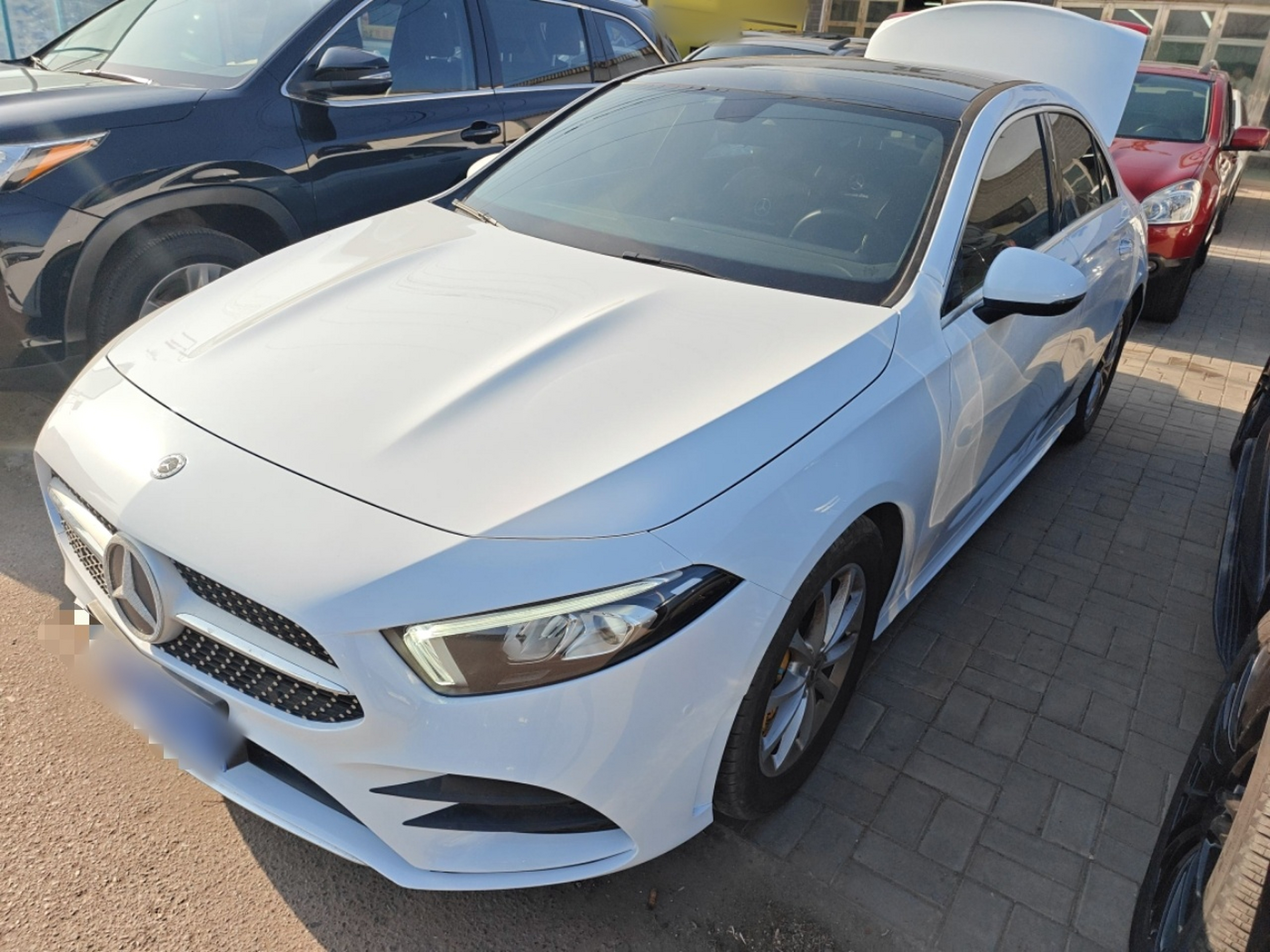 Под передней частью автомобиля