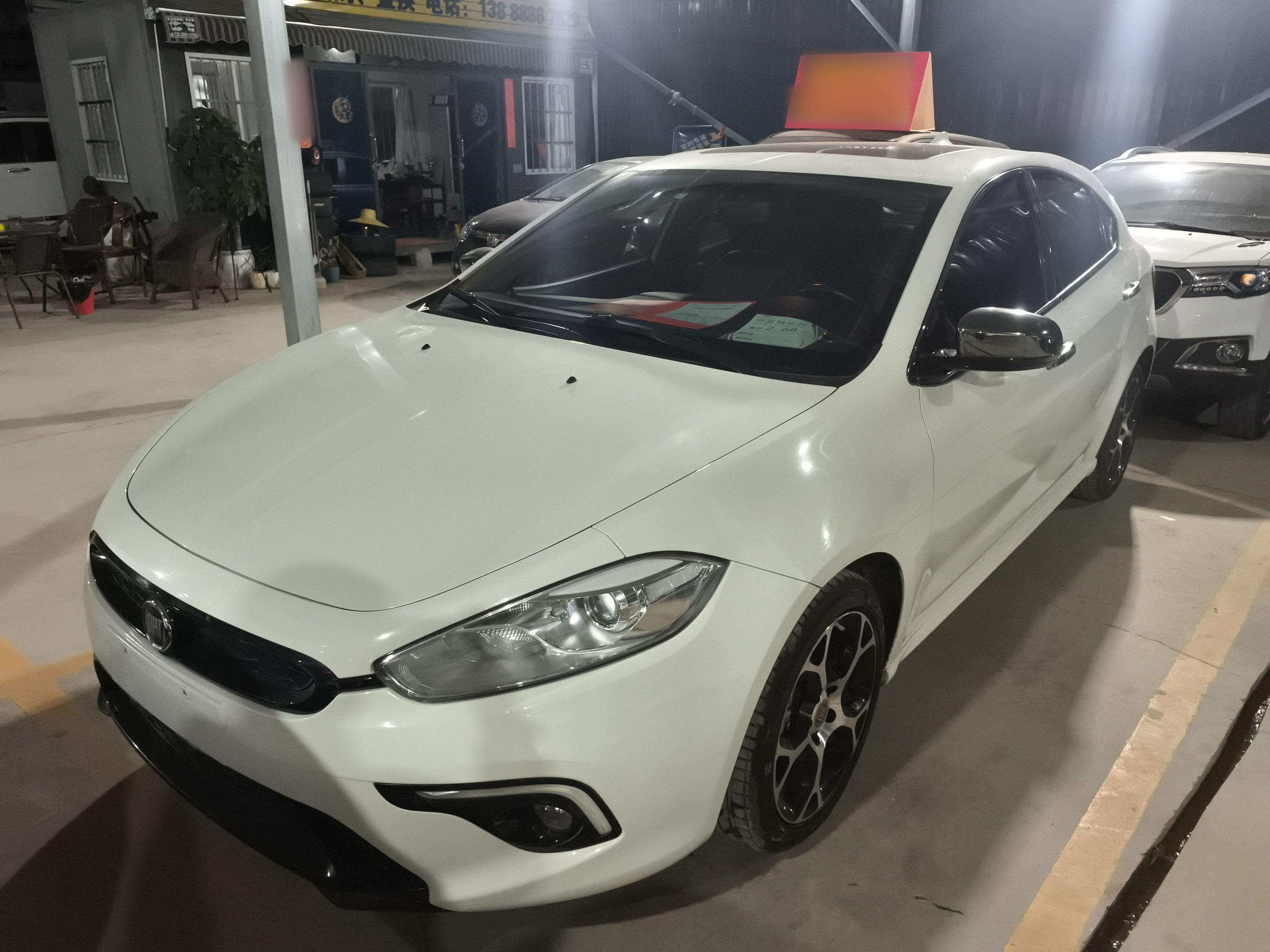 Под передней частью автомобиля