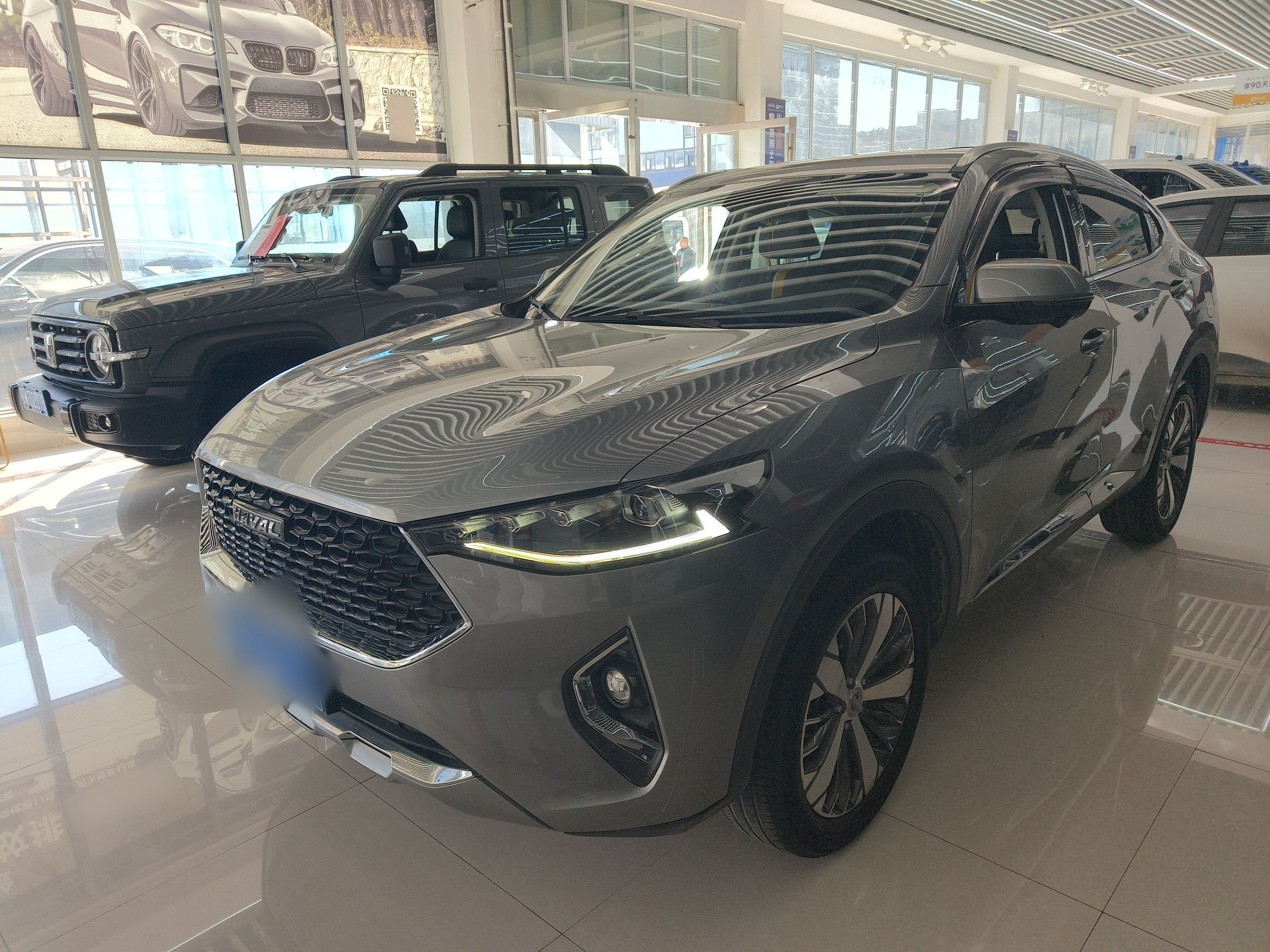 Под передней частью автомобиля