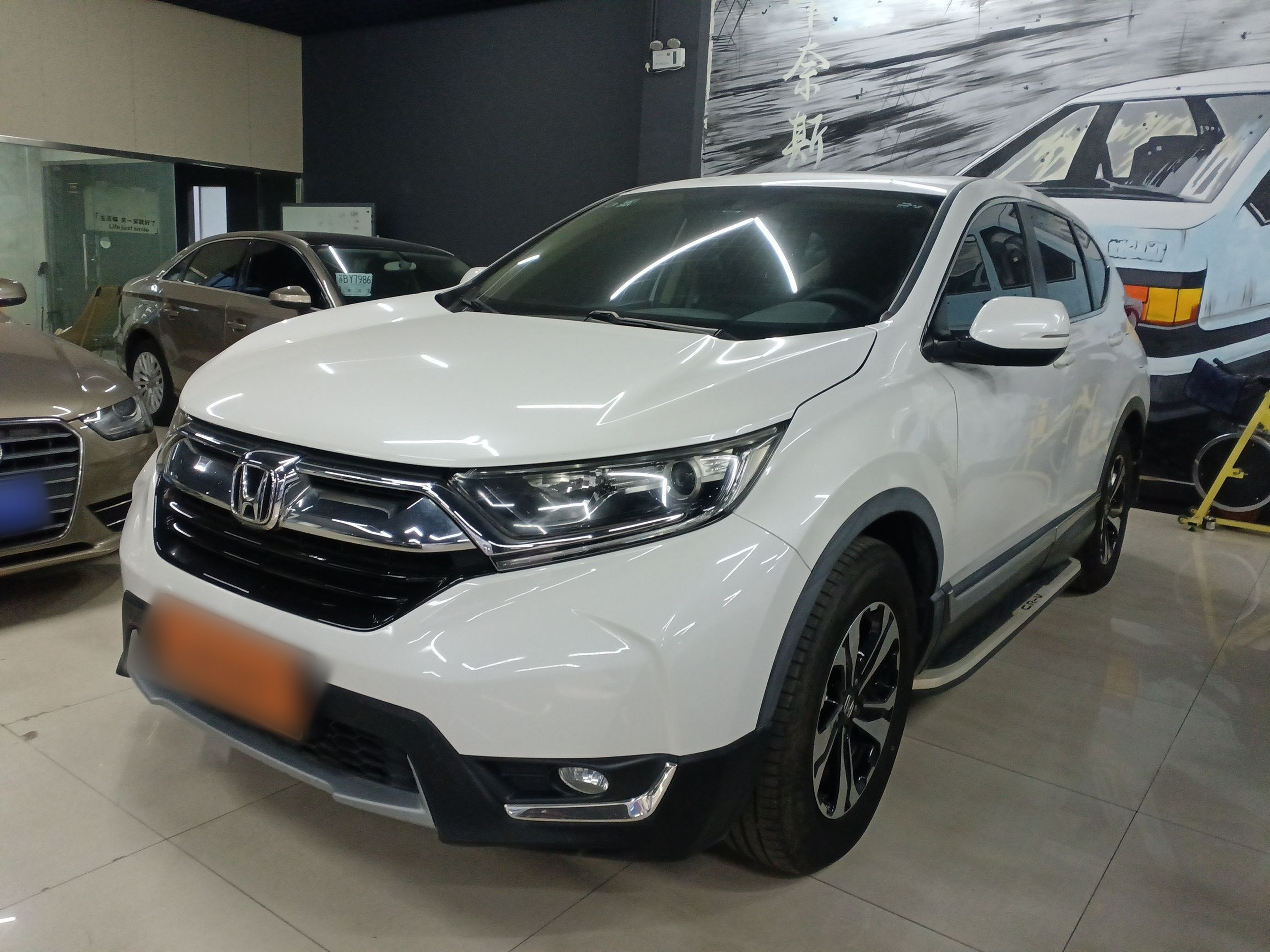 Под передней частью автомобиля