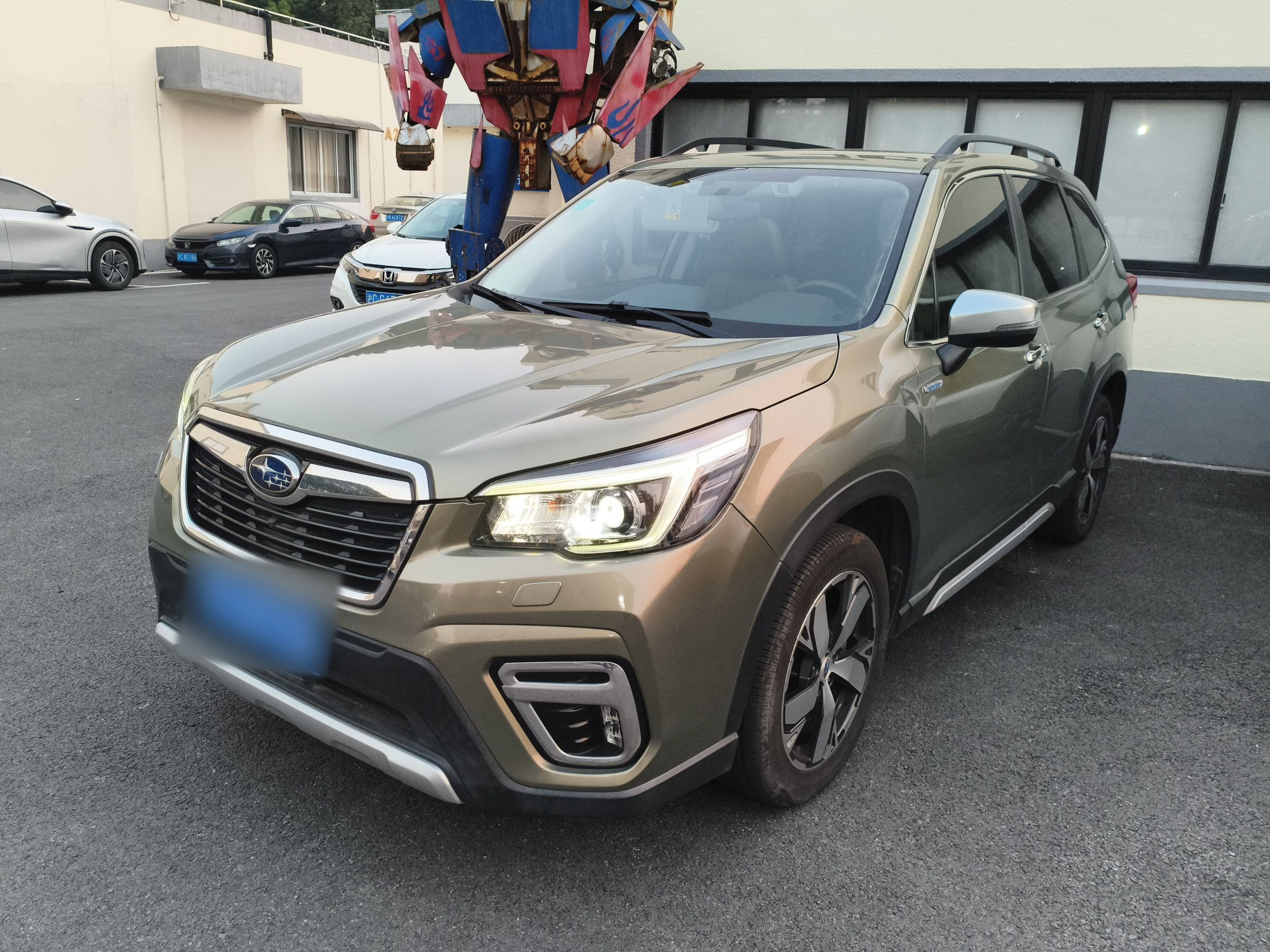 Под передней частью автомобиля