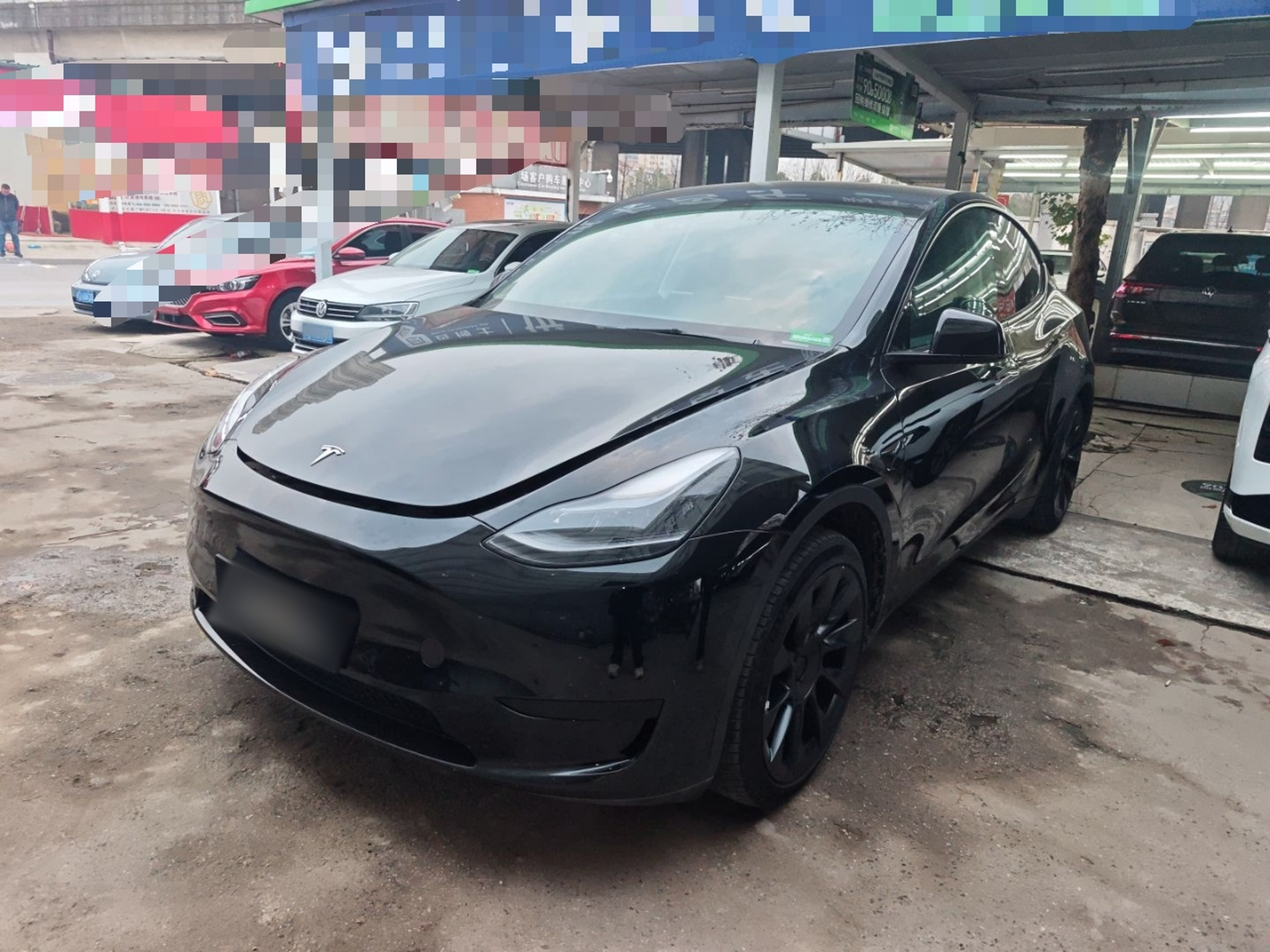 Под передней частью автомобиля