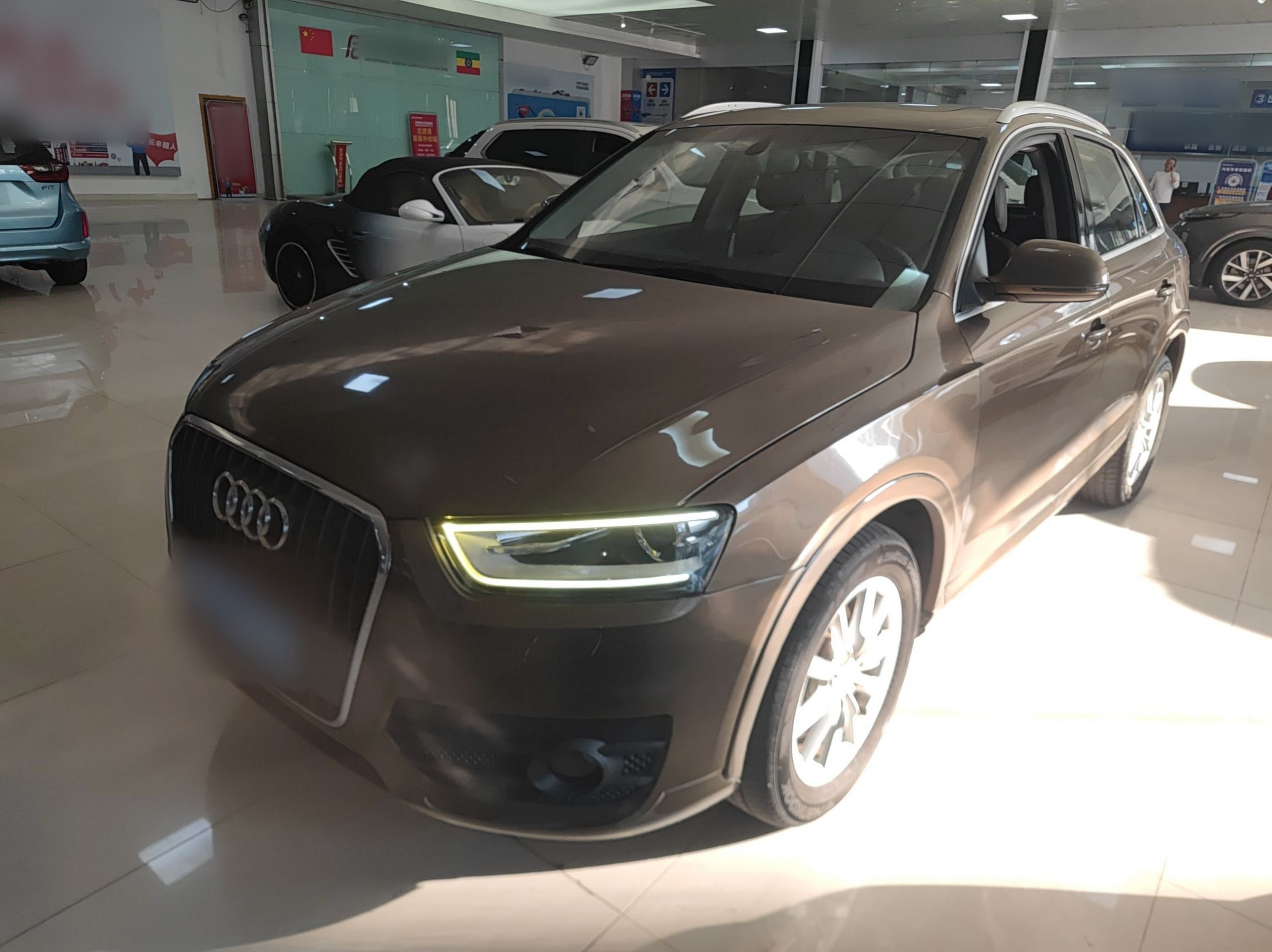 Под передней частью автомобиля