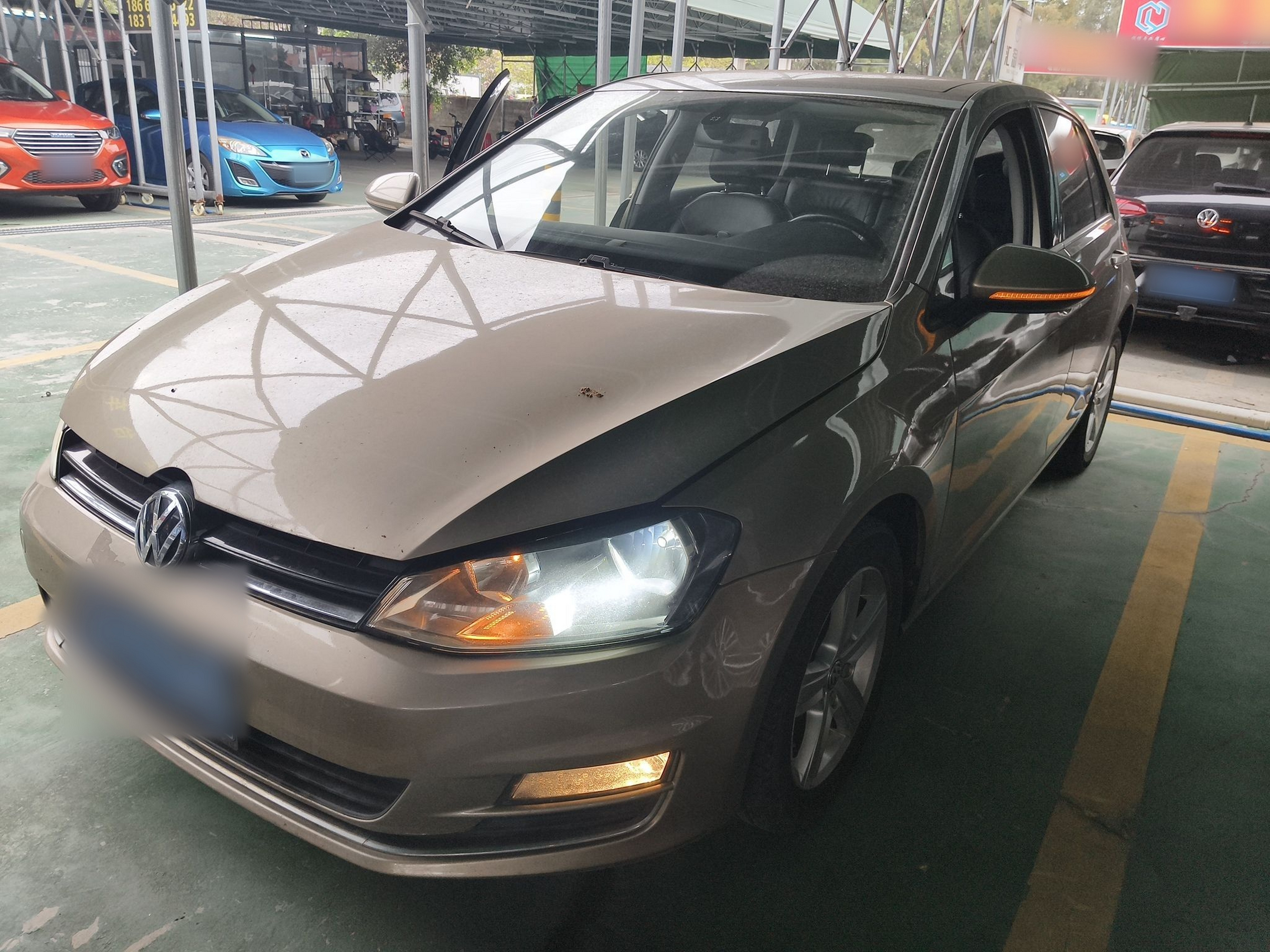 Под передней частью автомобиля