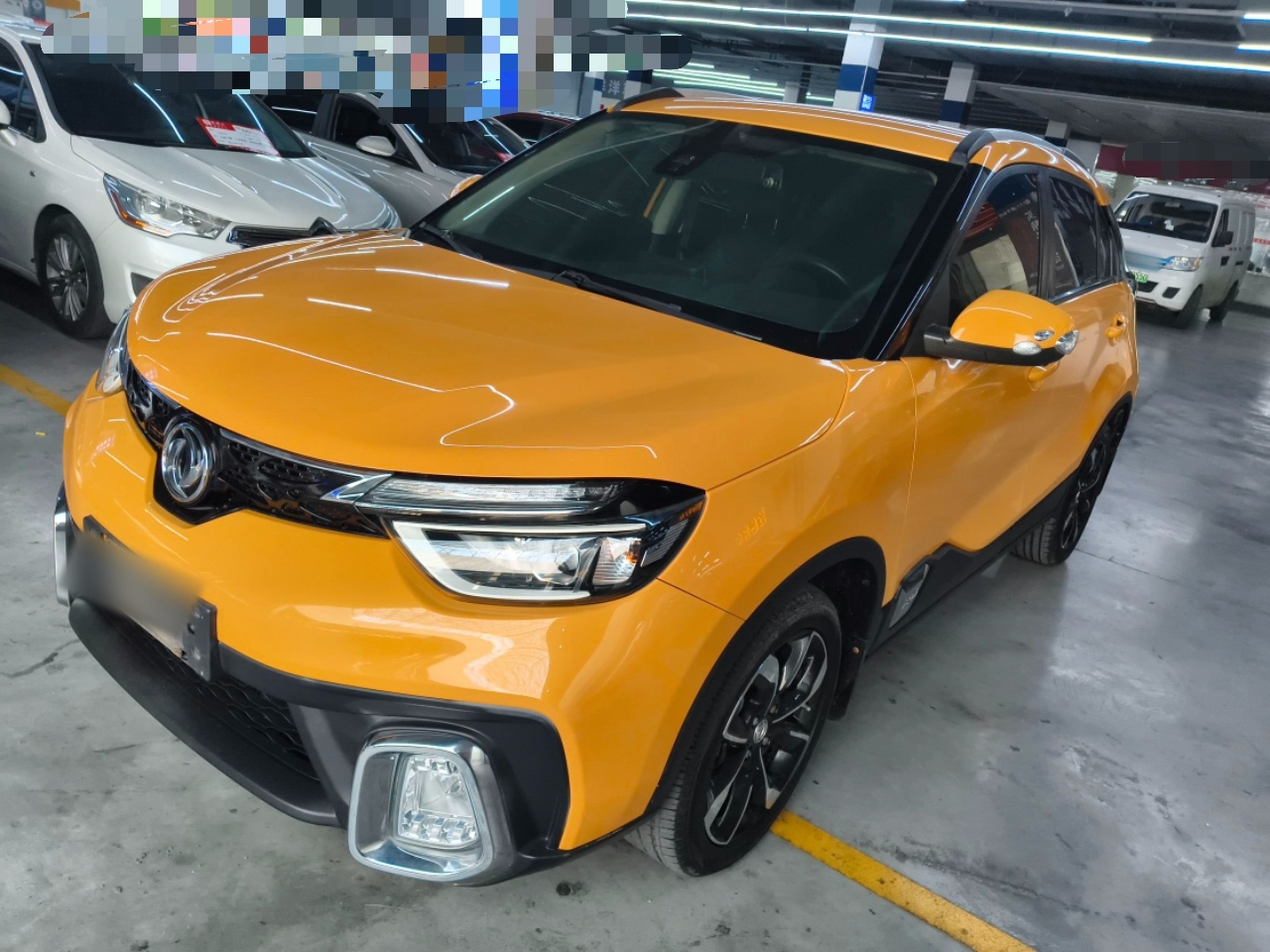 Под передней частью автомобиля