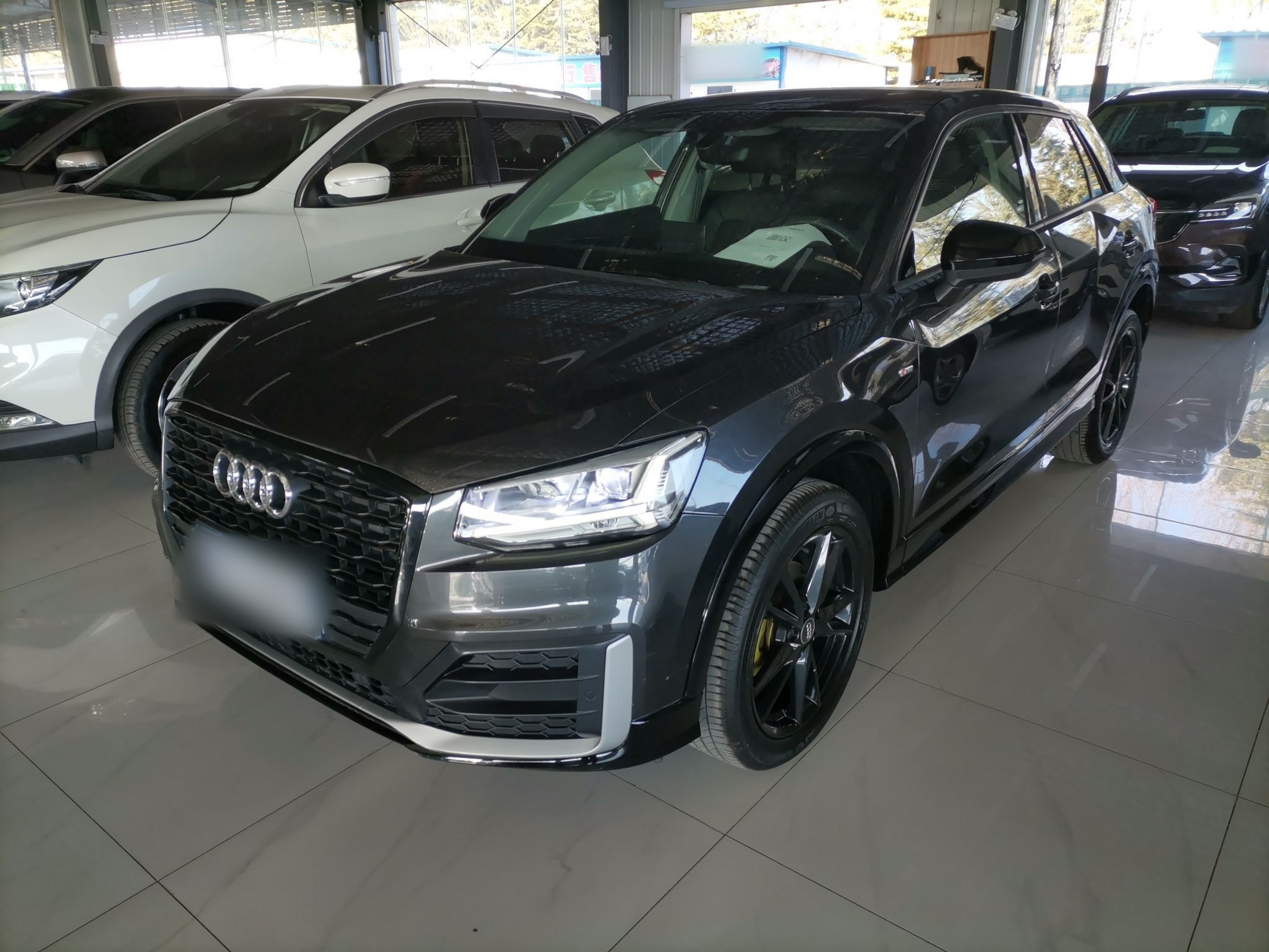 Под передней частью автомобиля