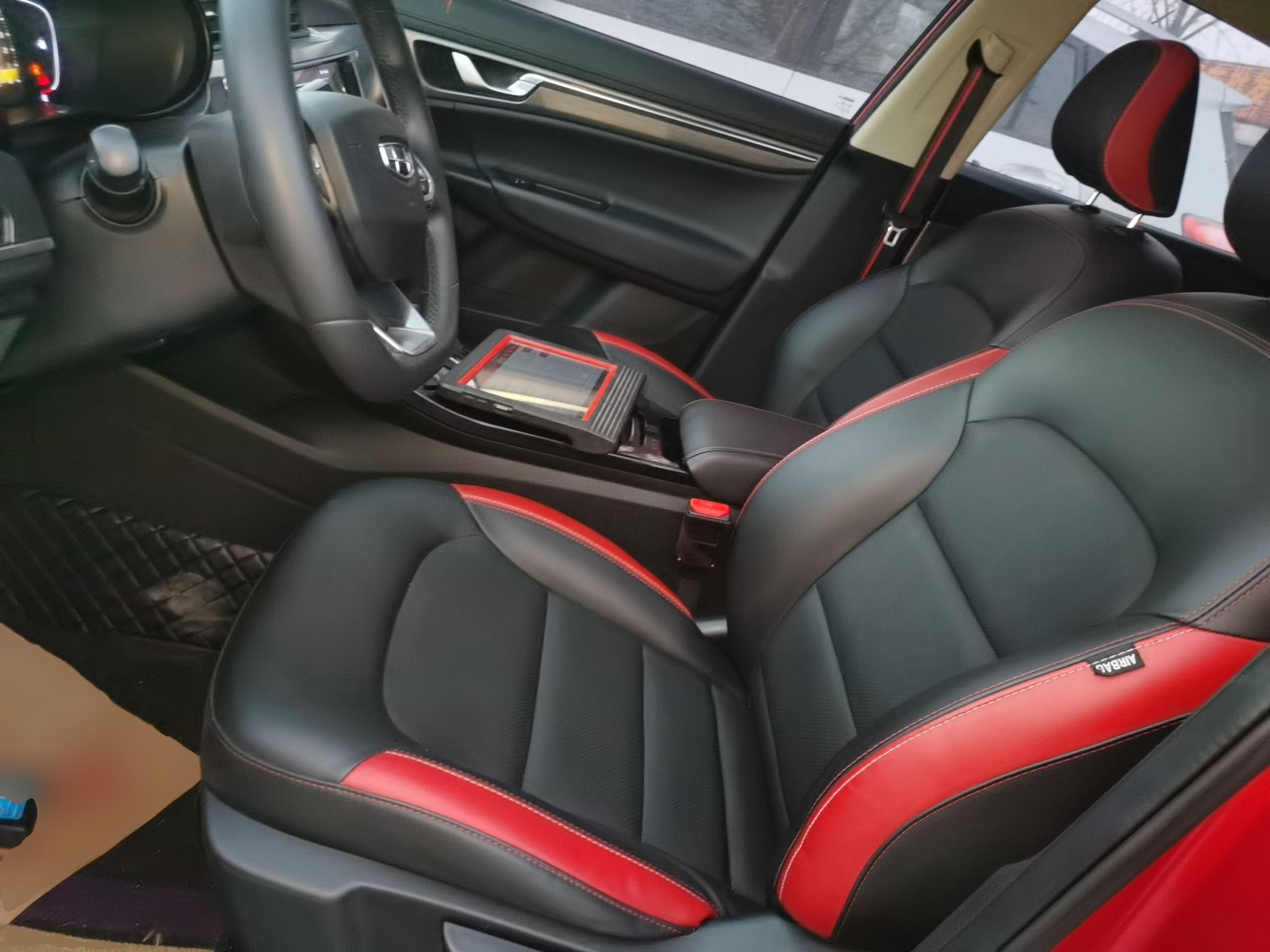 Переднее сиденье в автомобиле