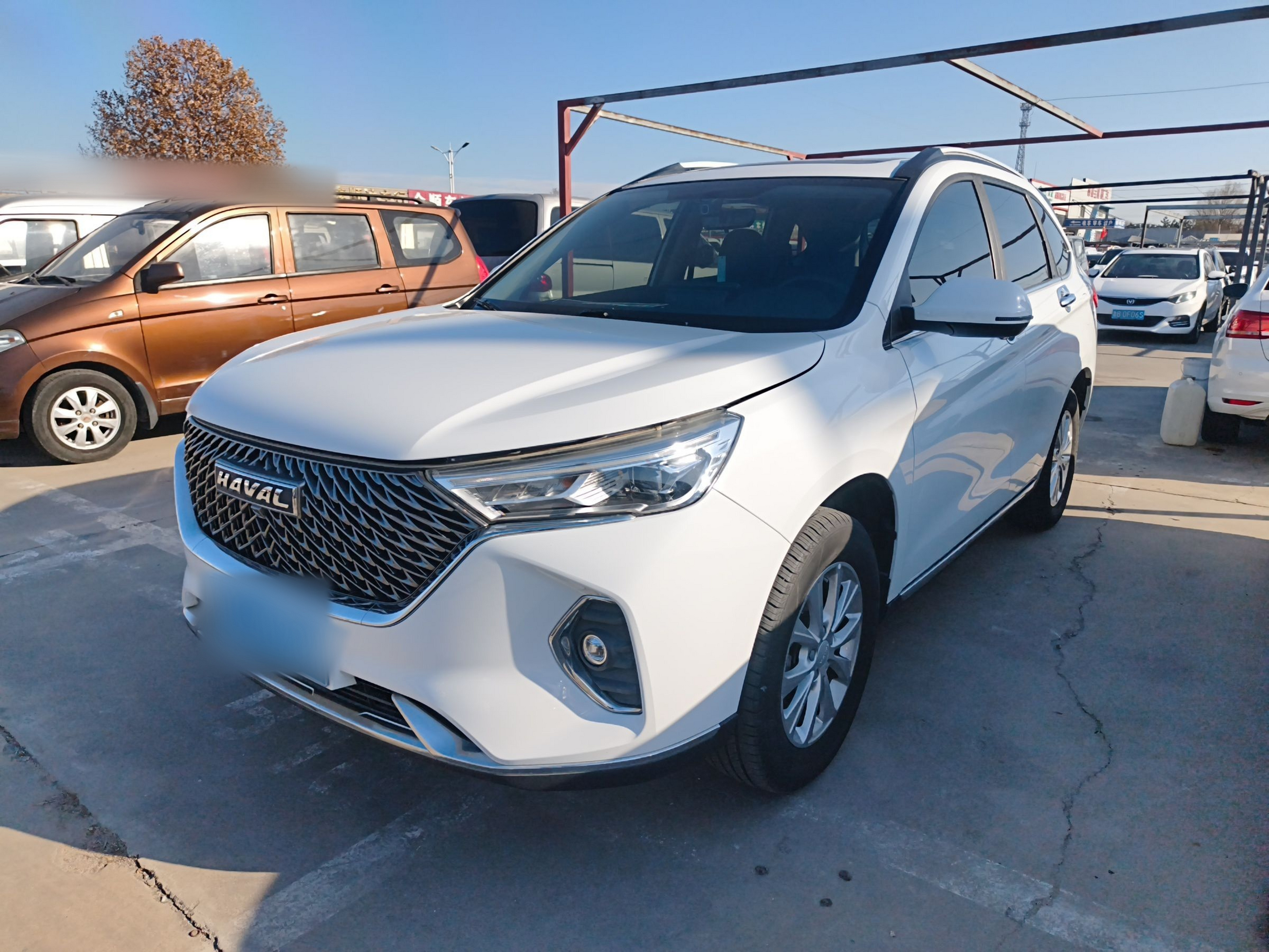 Под передней частью автомобиля