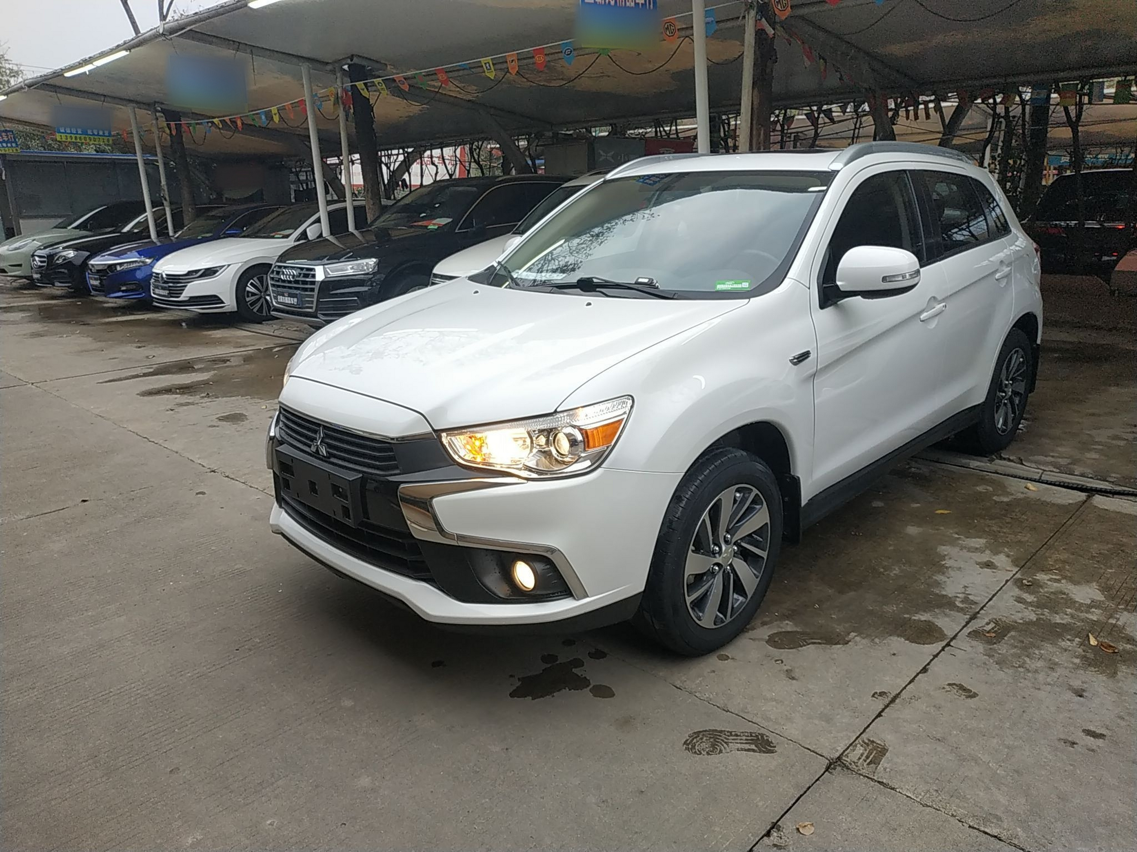 Под передней частью автомобиля