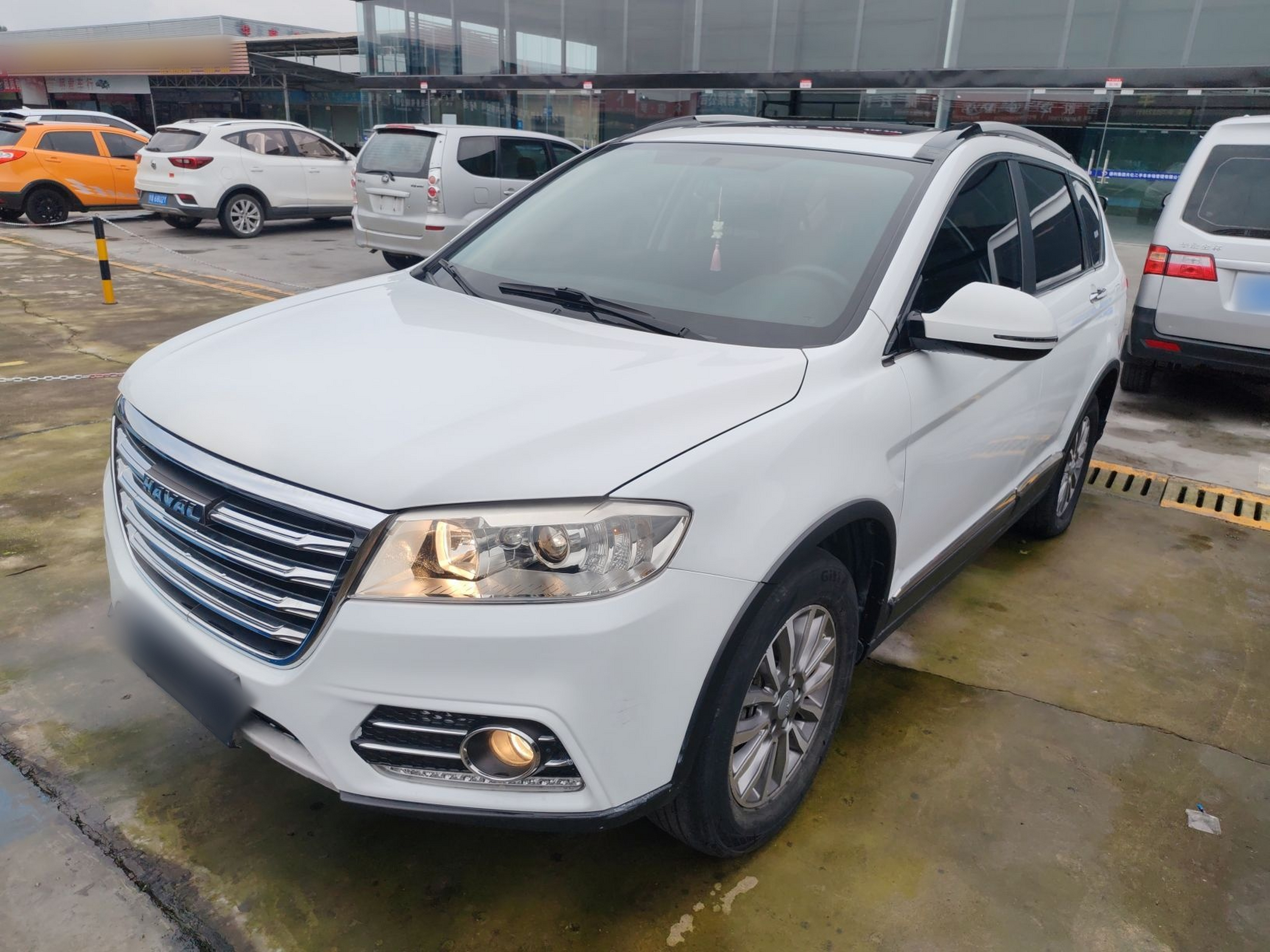 Под передней частью автомобиля