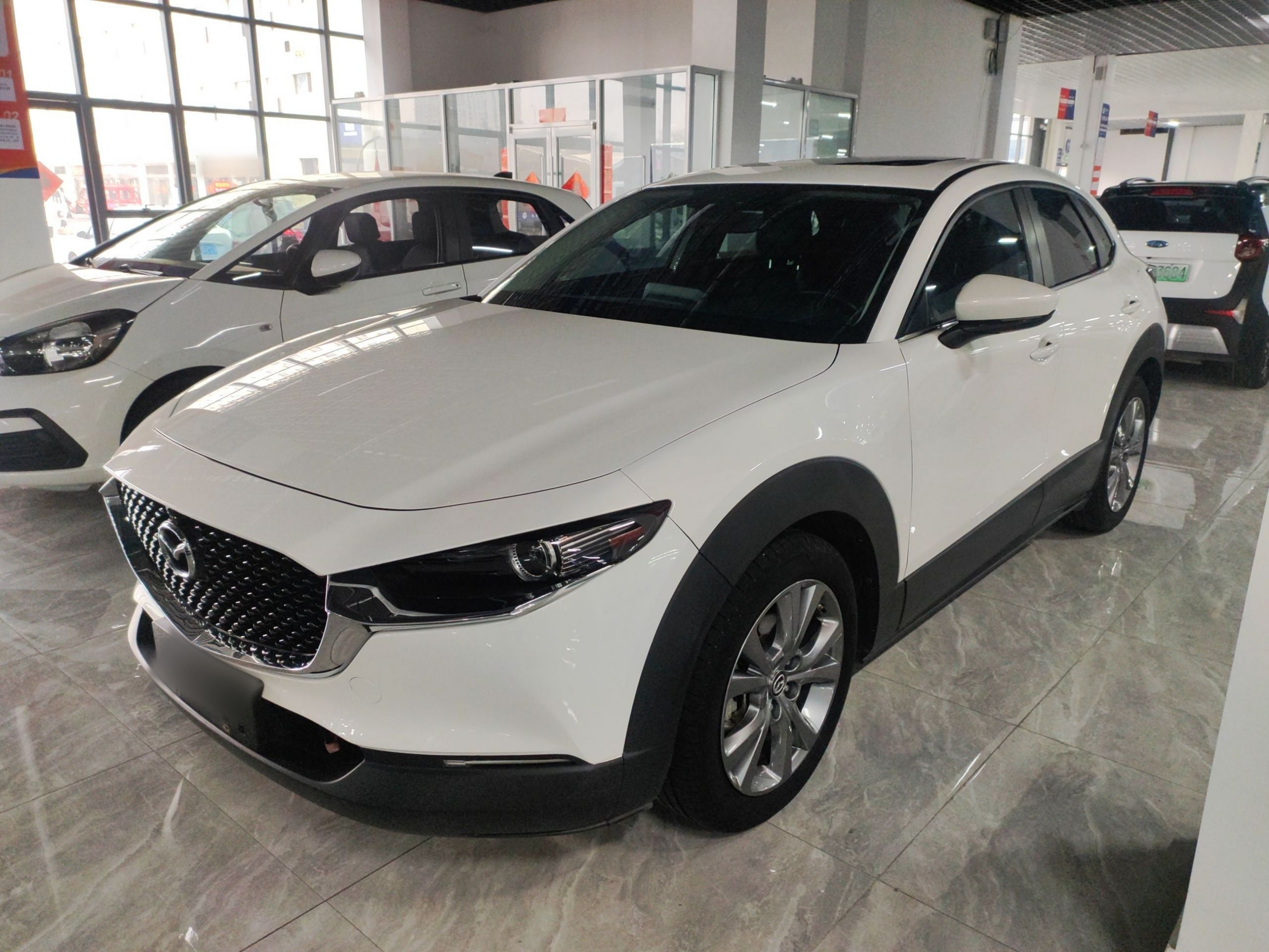 Под передней частью автомобиля