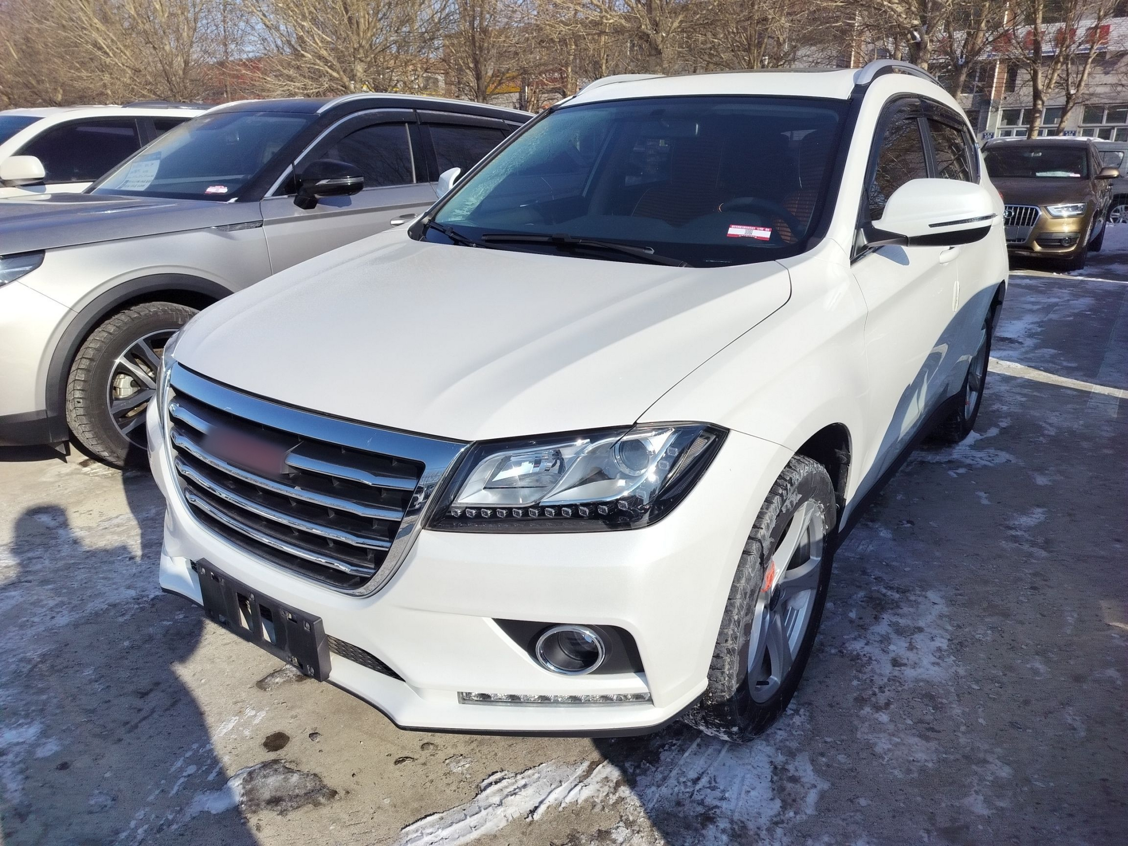 Под передней частью автомобиля