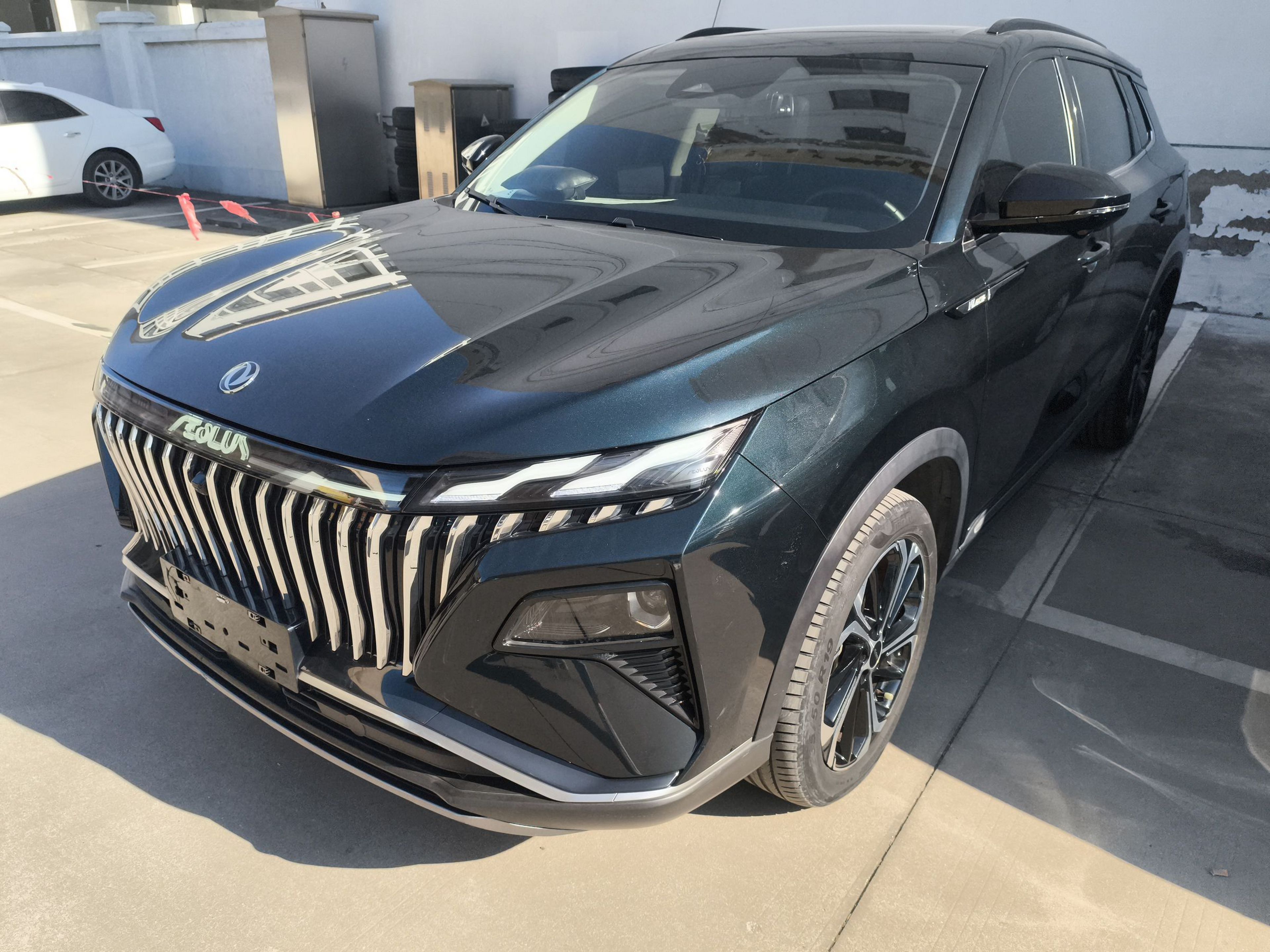 Под передней частью автомобиля