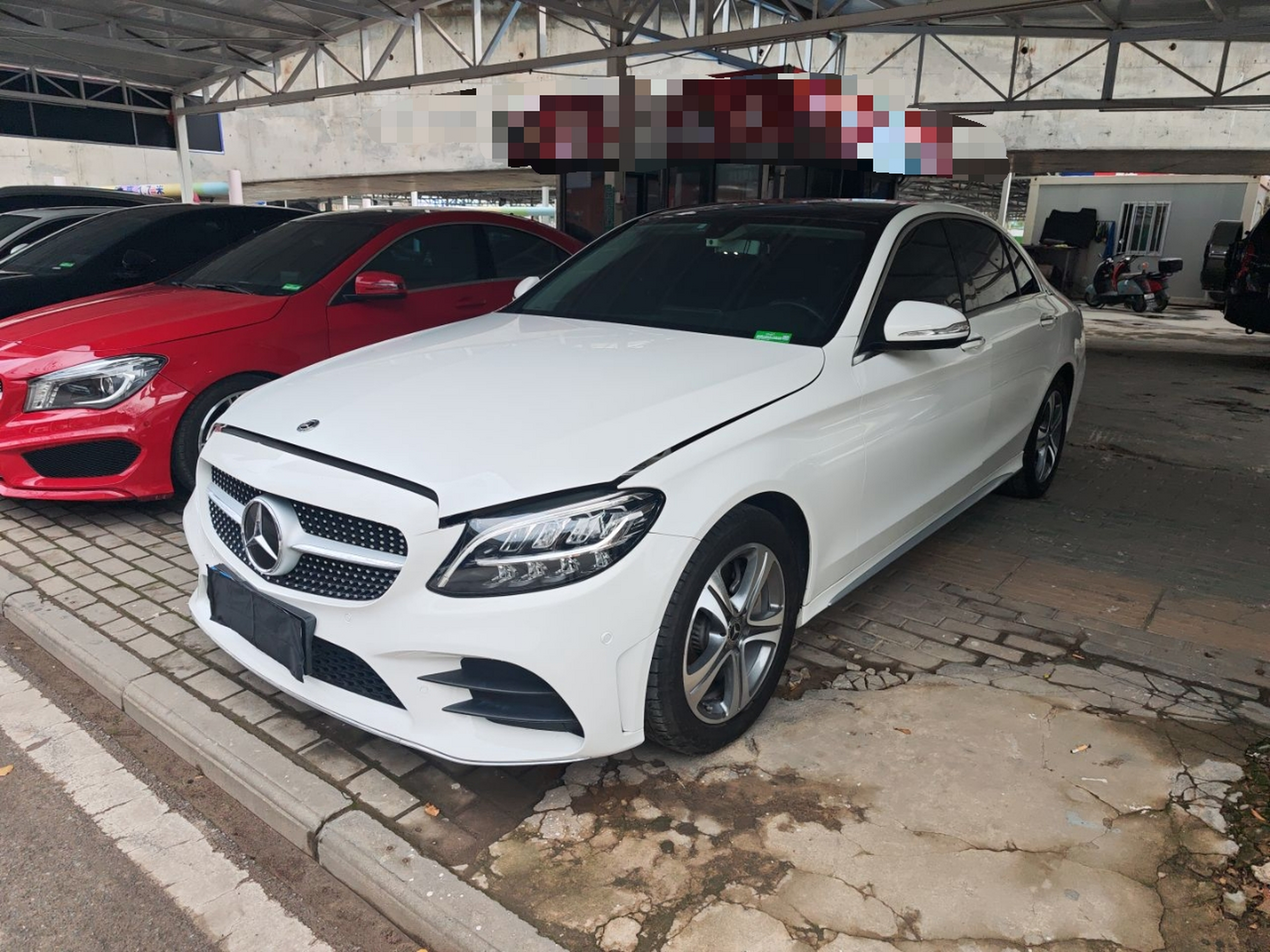 Под передней частью автомобиля