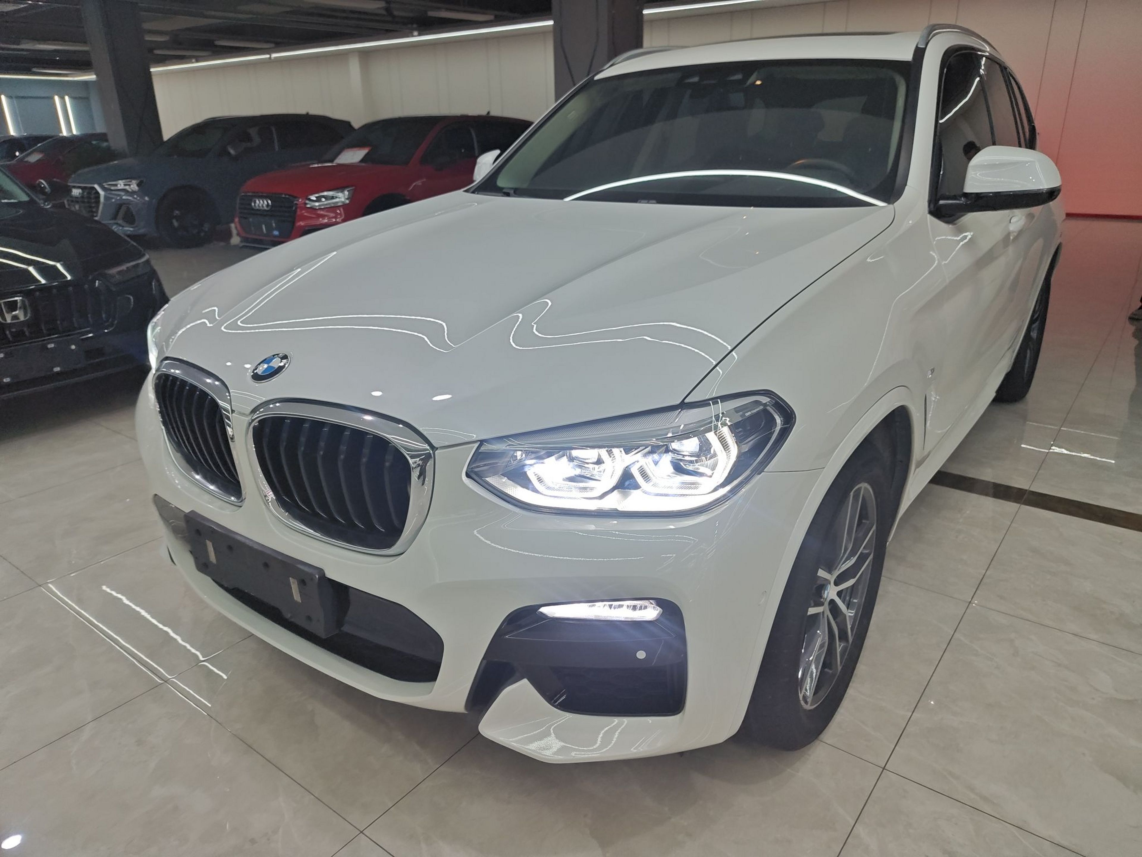 Под передней частью автомобиля